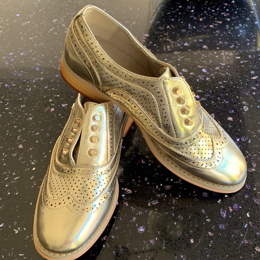 Gold Oxfords. Pull on style. Size 9. Never worn.